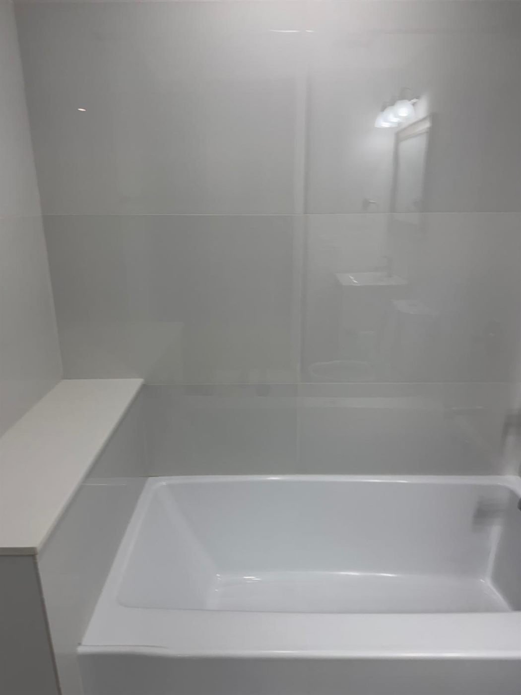 Spotless white bathtub after a deep cleaning